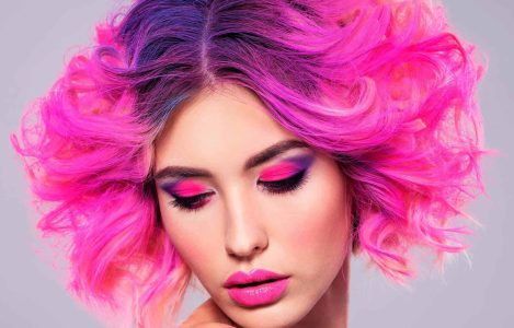 portrait-of-beautiful-young-woman-with-bright-pink-BF686FY-scaled.jpg